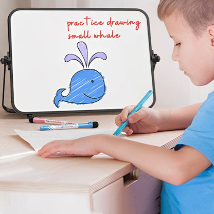 Tableau blanc utiliser par un enfant